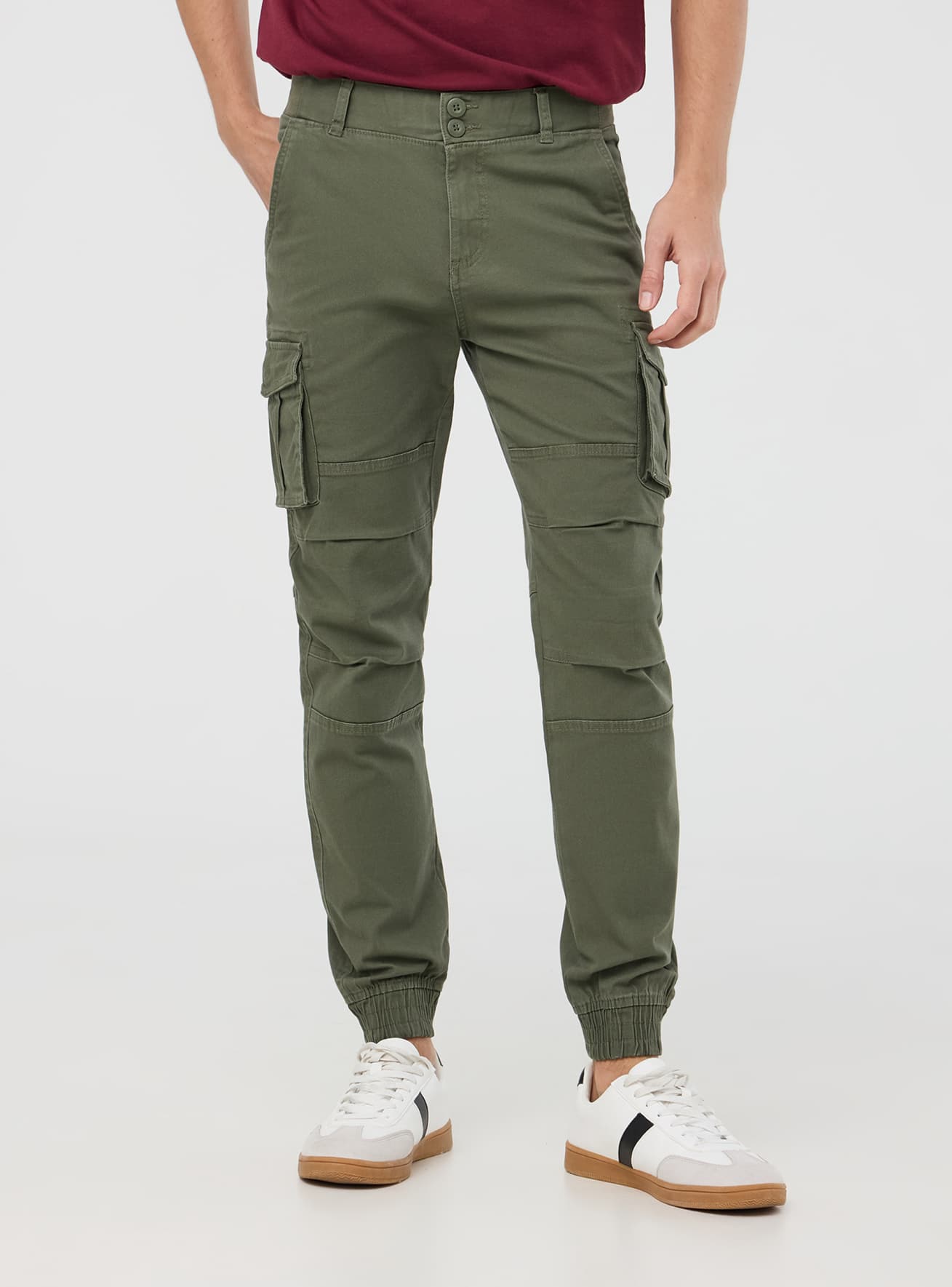 Pantaloni cargo tinta unita con polsini