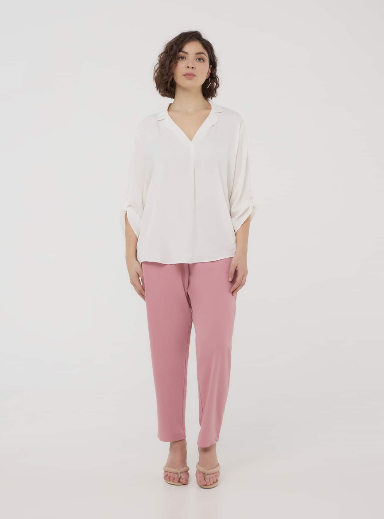 Blusa tinta unita con scollo a v