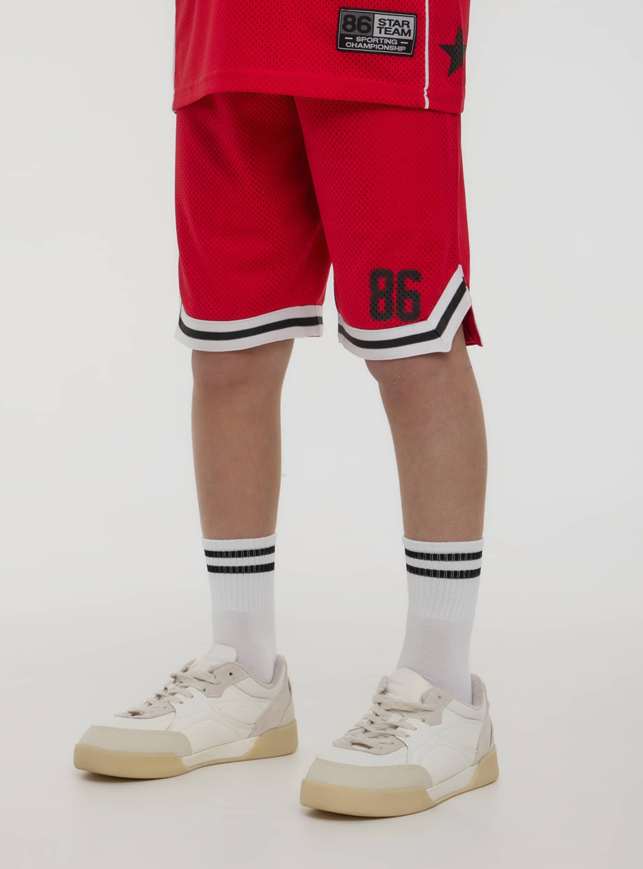 Pantaloncini in rete stile basket