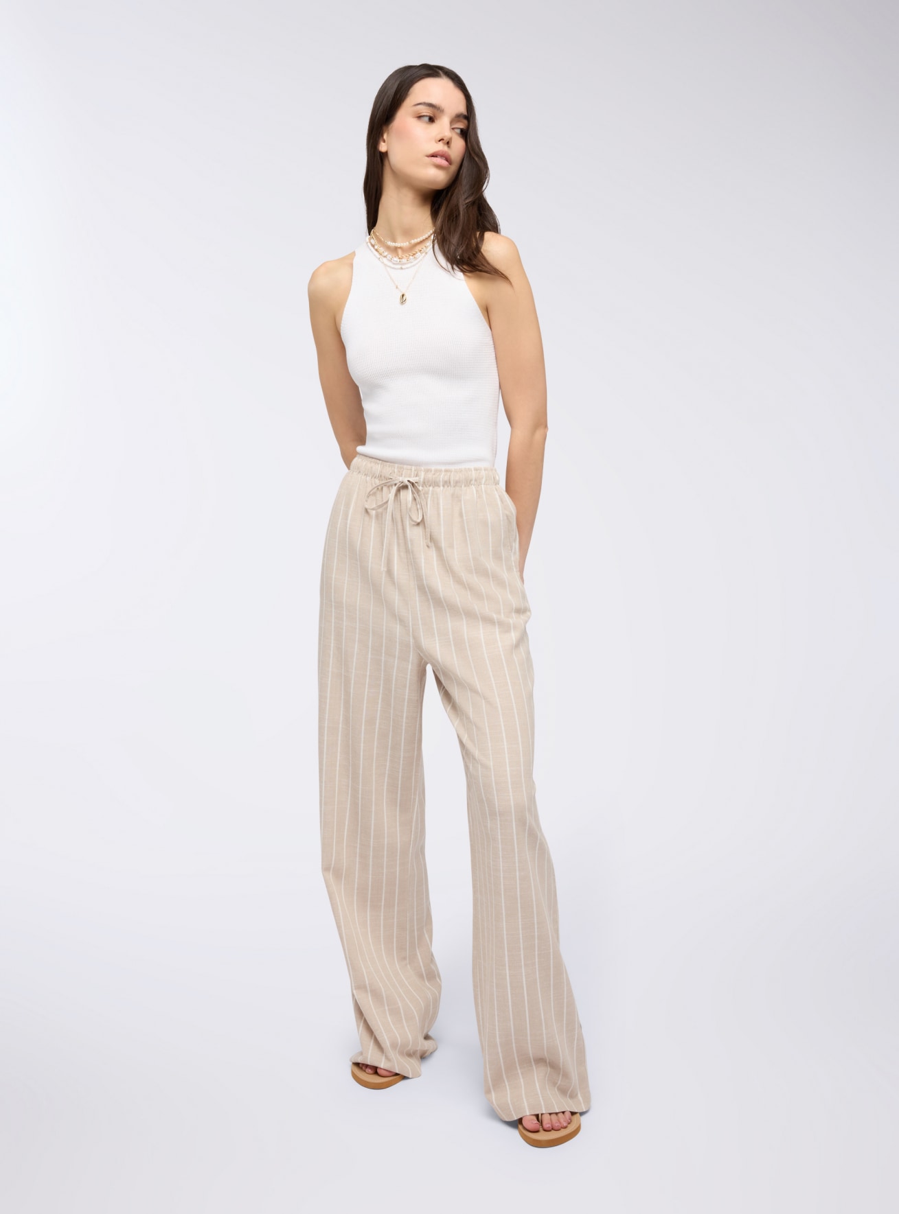 Pantaloni wide leg a righe in misto lino