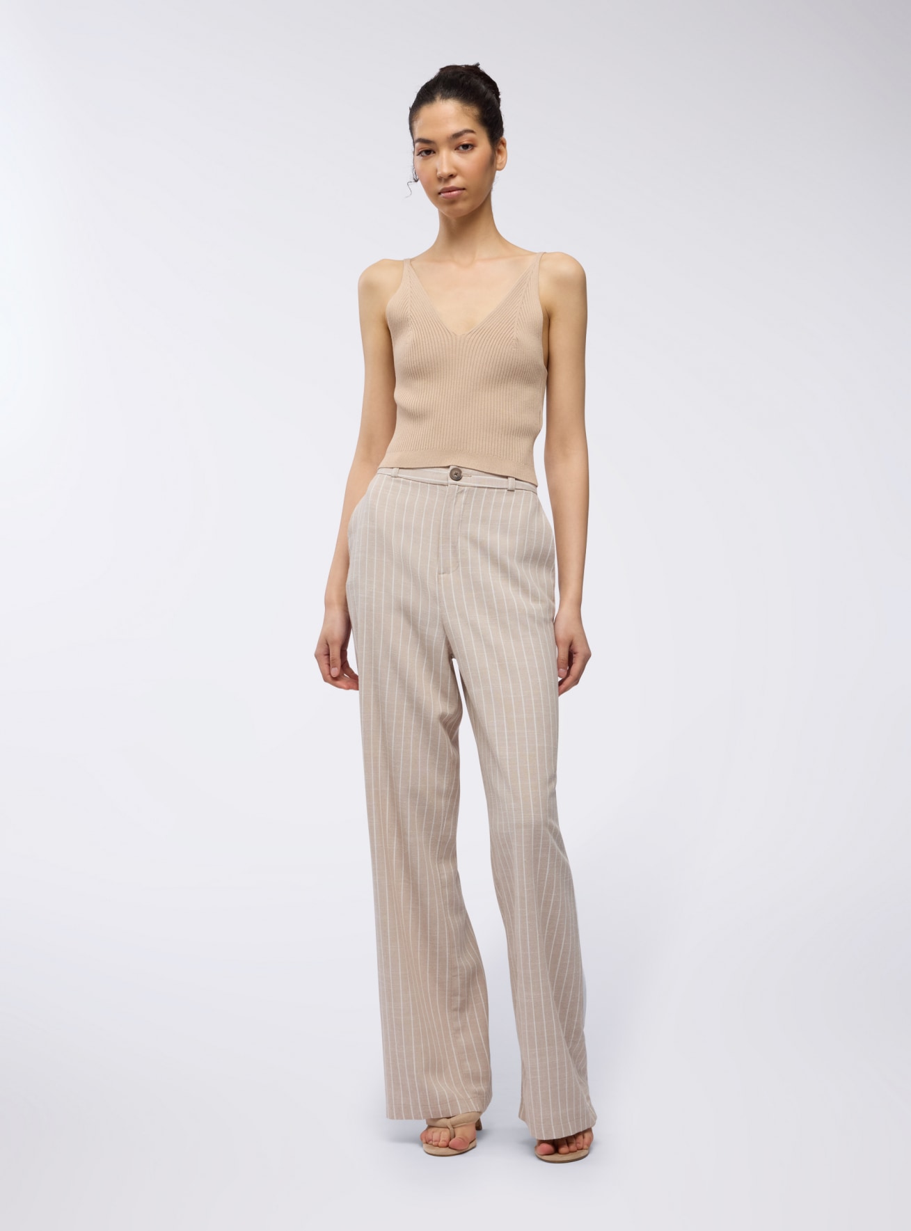 Pantaloni dad fit a righe in misto lino
