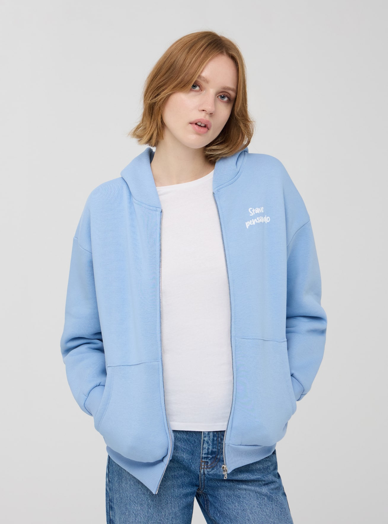 Felpa over con cappuccio zip e scritta Celeste Acquista Online Terranova