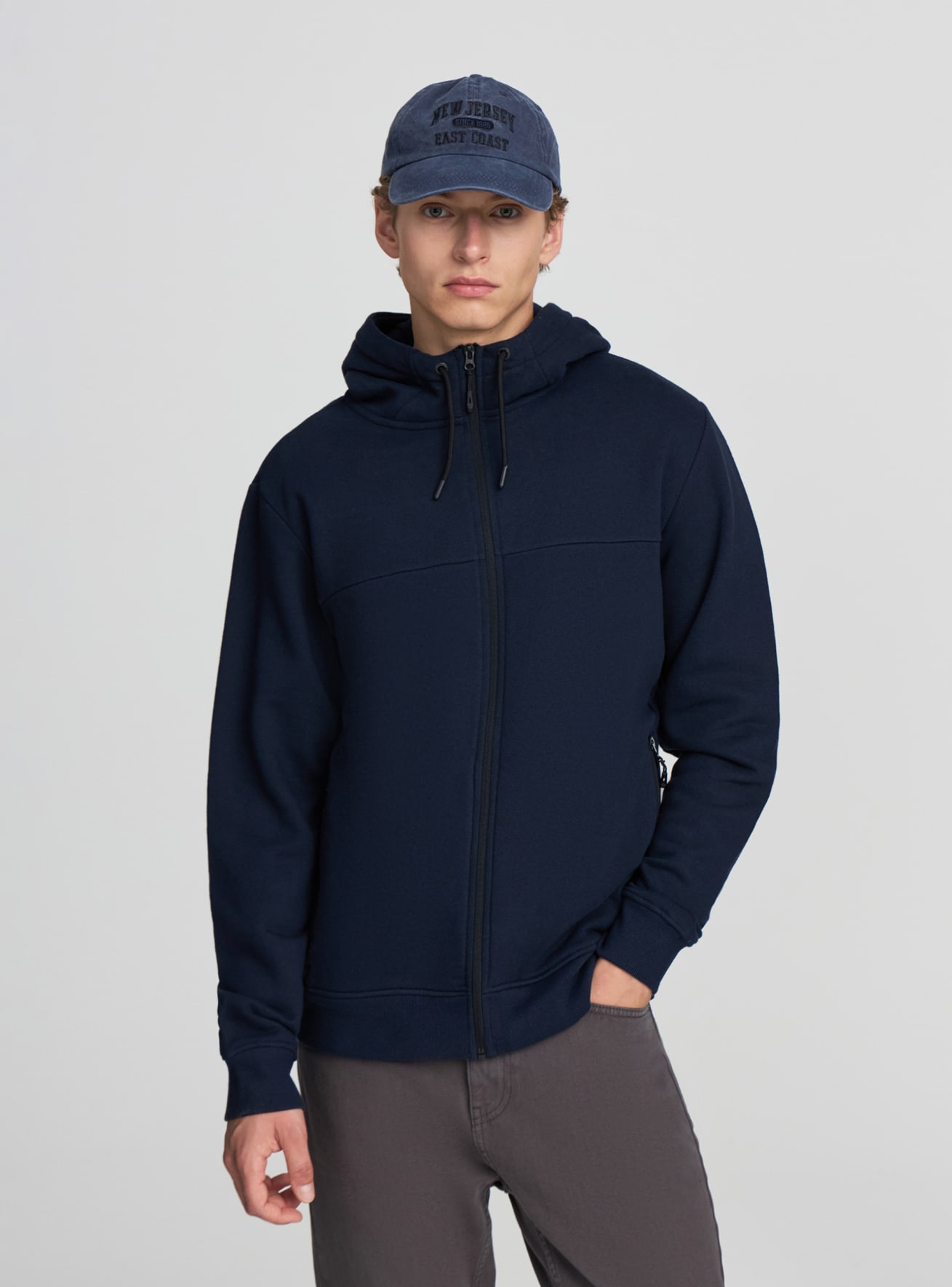 Felpa tecnica con cappuccio e zip