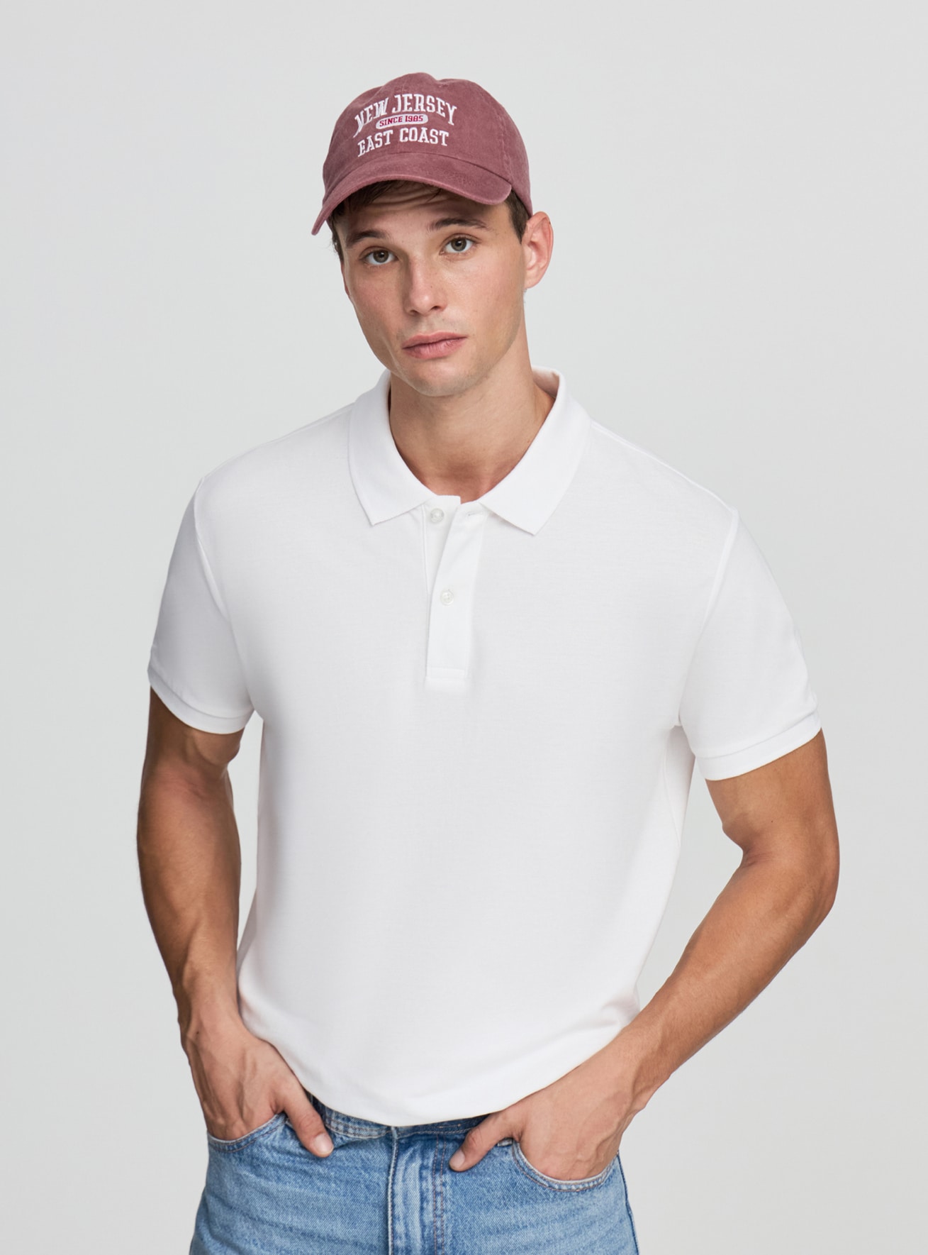 Solid colour piqué polo shirt