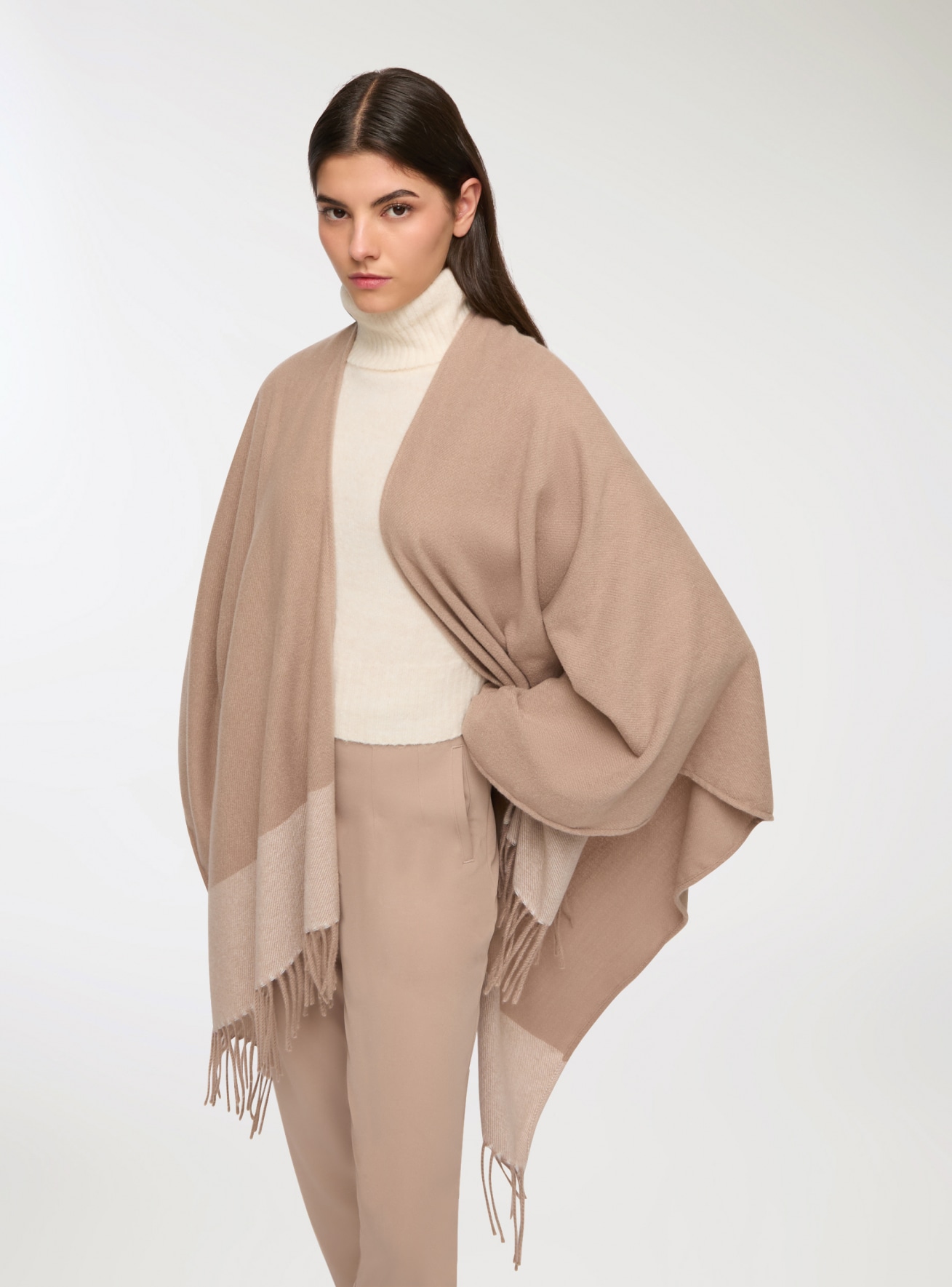 Poncho con frange