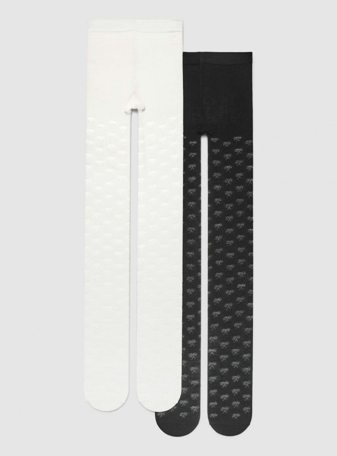 Pack 2 collant pesanti con fantasia fiocchi