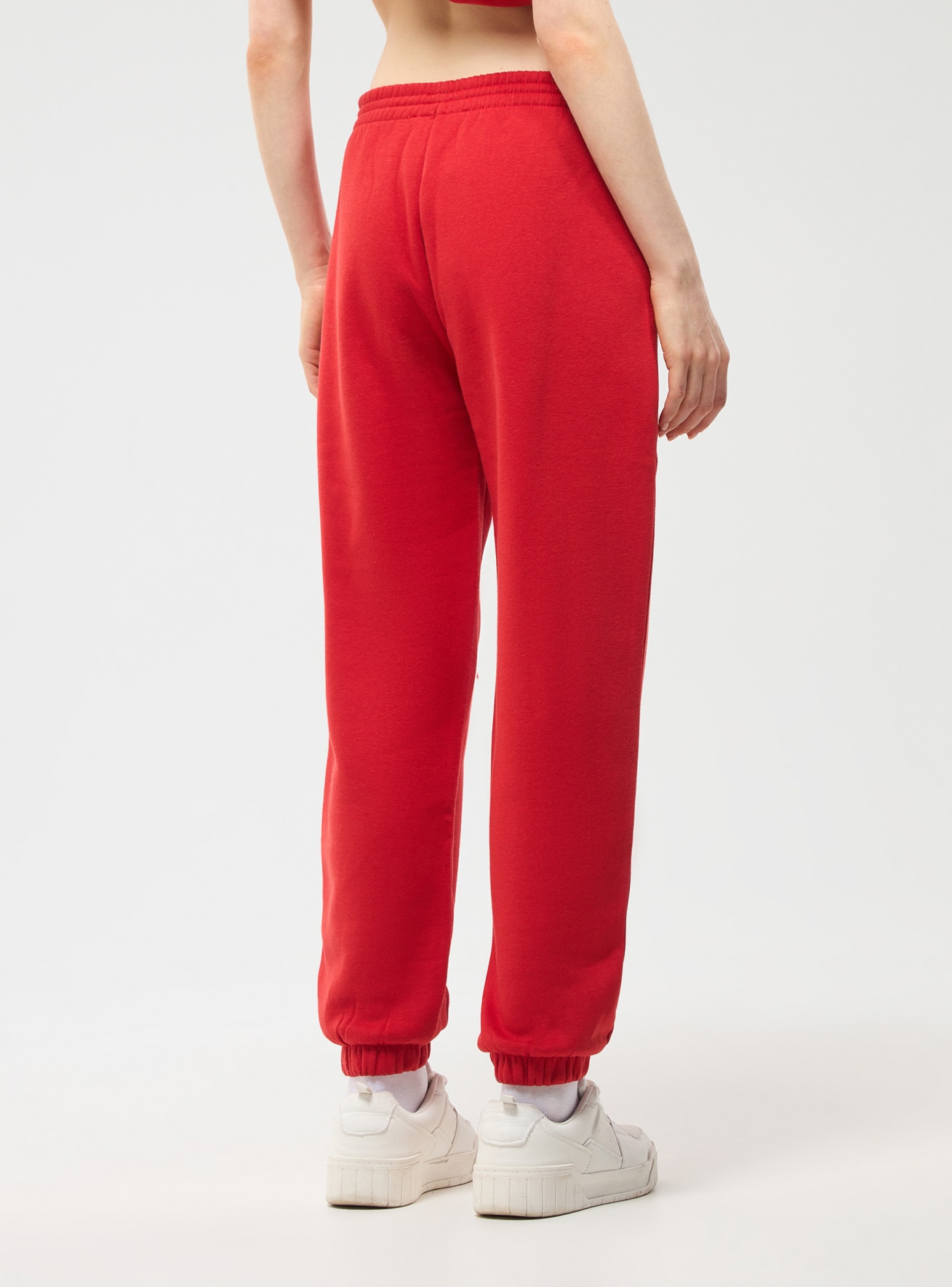 Red High-waisted jogging bottoms in single-colour fabric - Buy Online