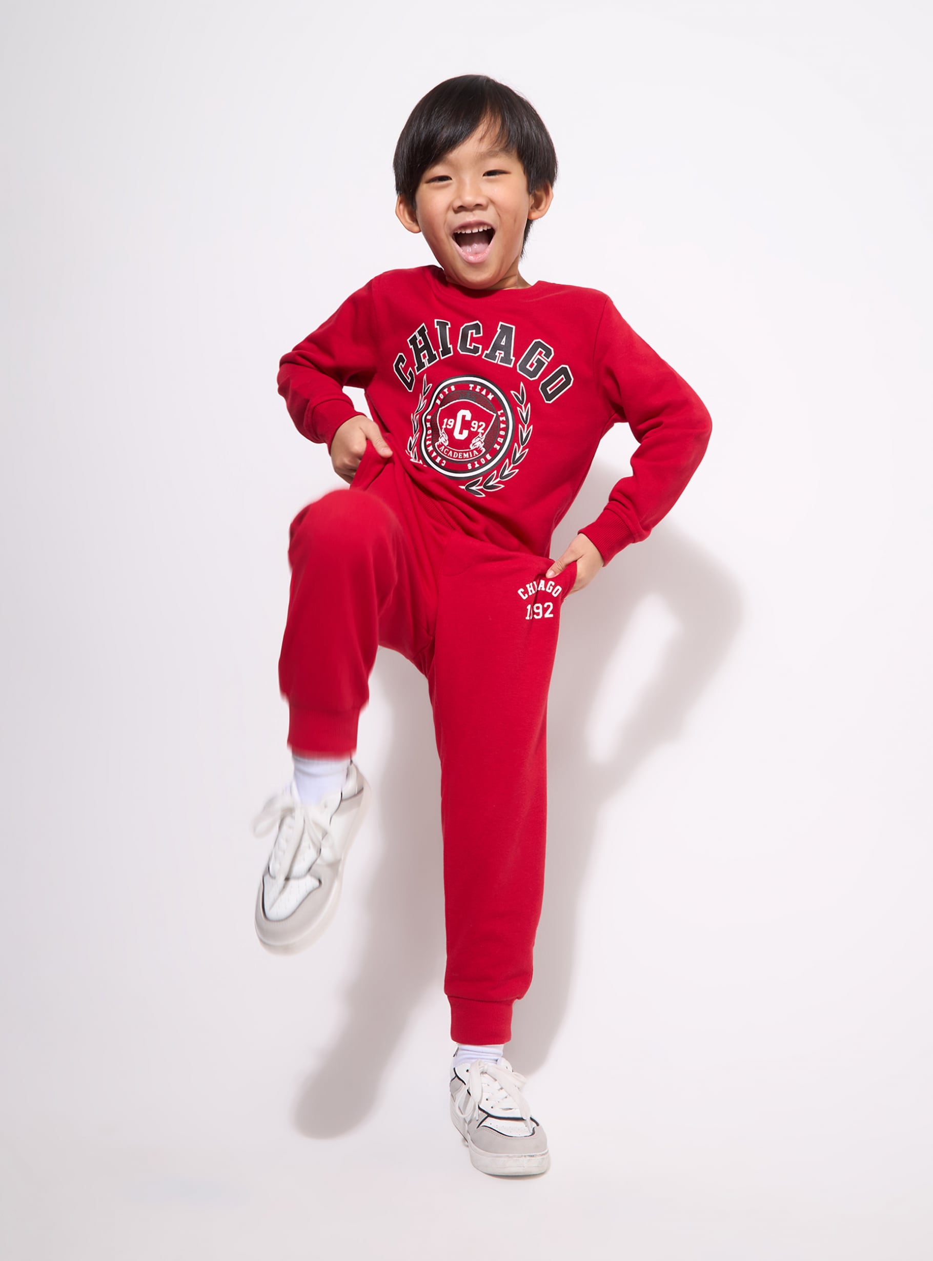 Red bright Tracksuit bottoms with sporty print - Buy Online