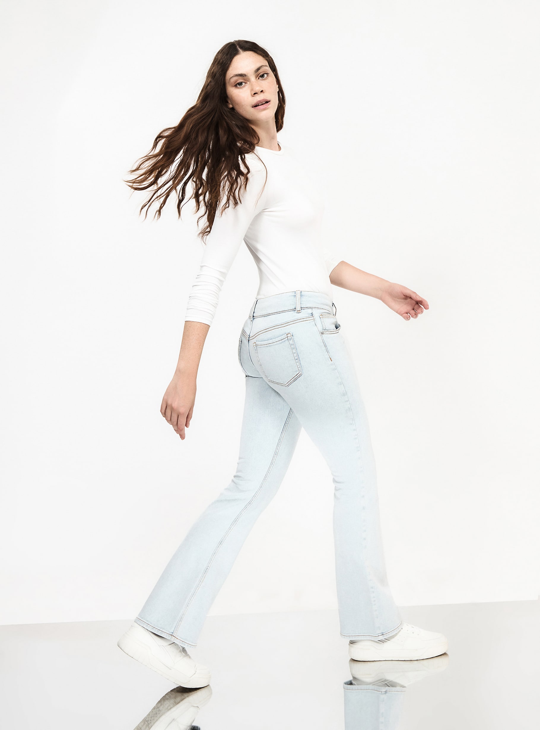 Light blue denim Low-waisted flared jeans - Buy Online