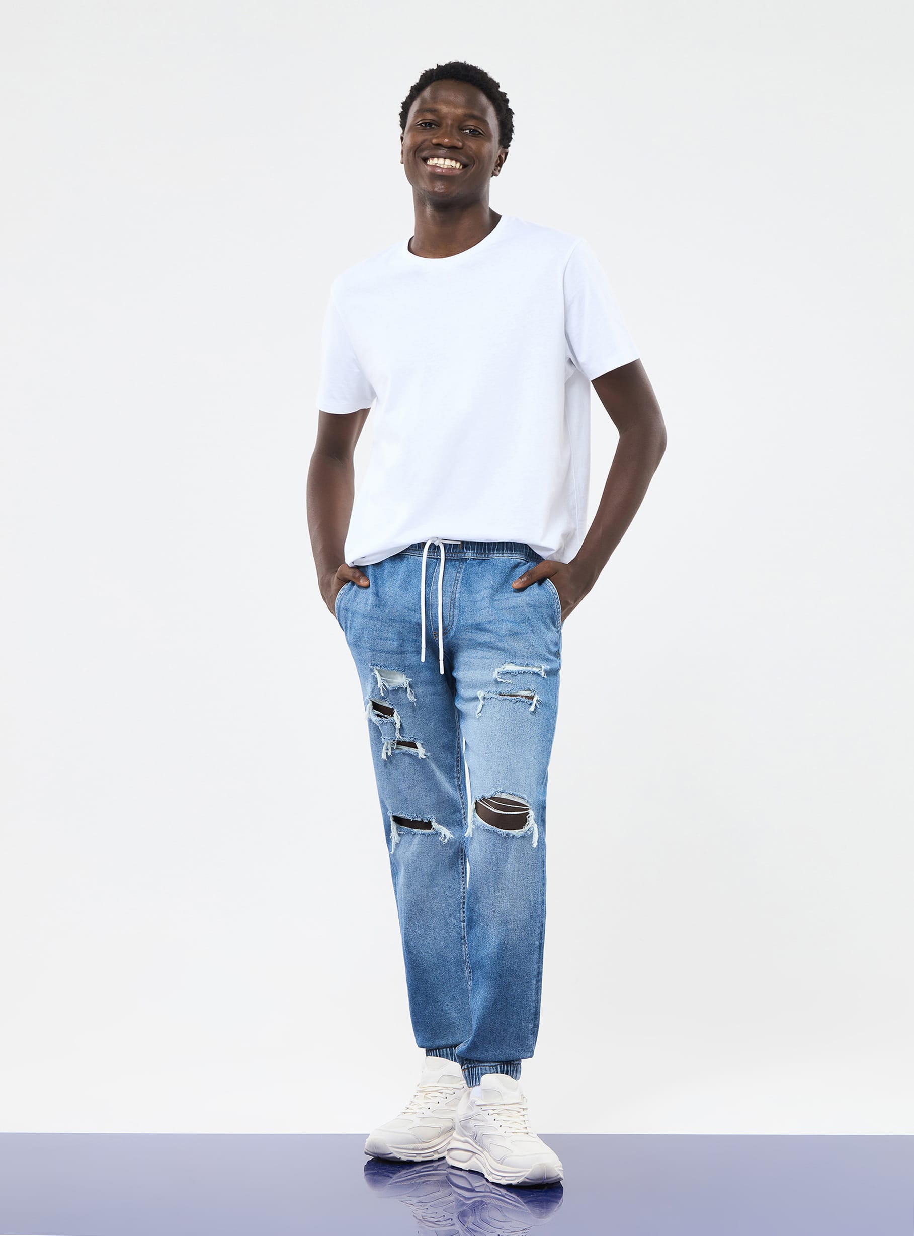 Middle blue denim Jogger-style ripped jeans - Buy Online