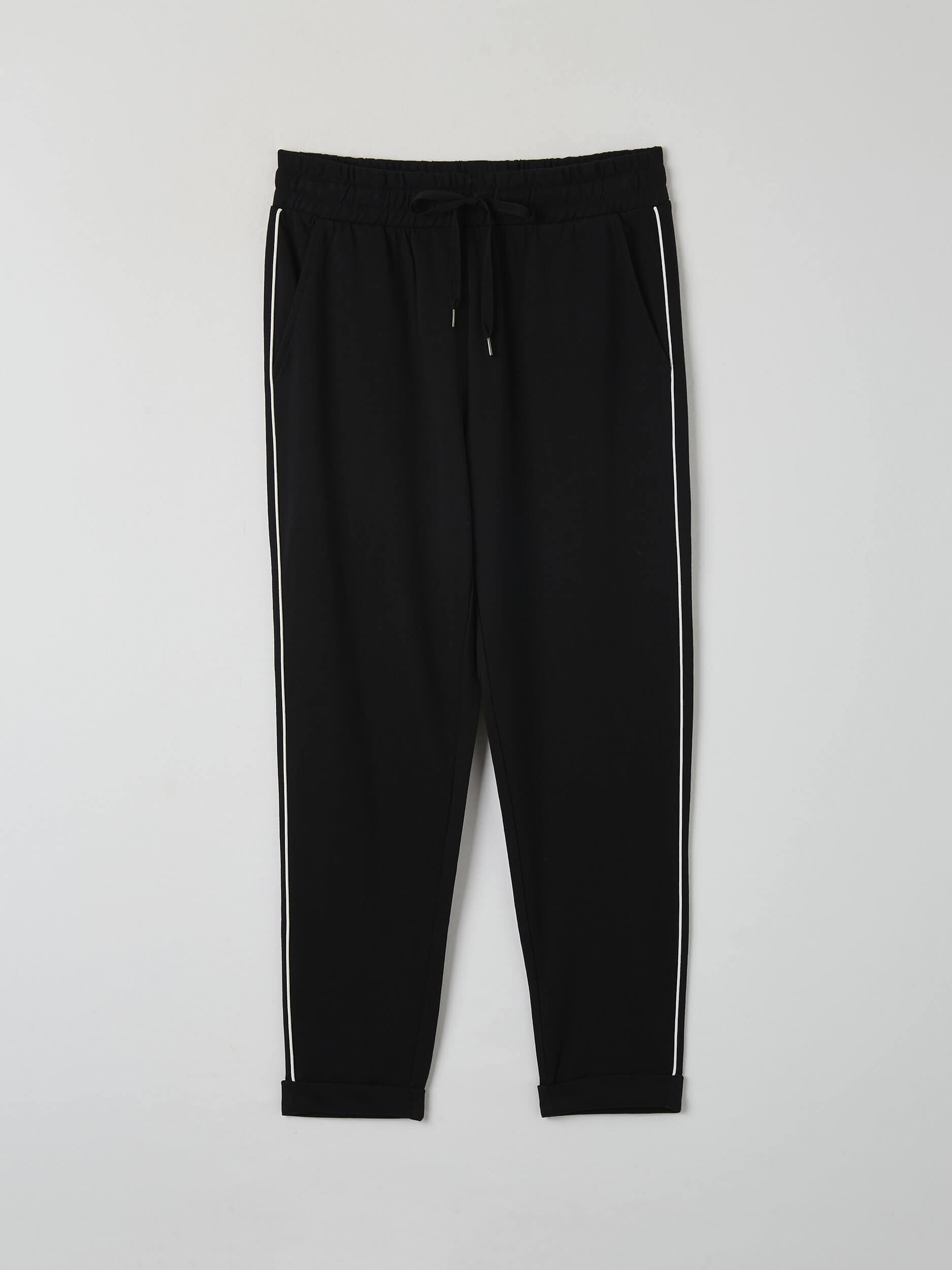 black tracksuit bottoms with white stripe