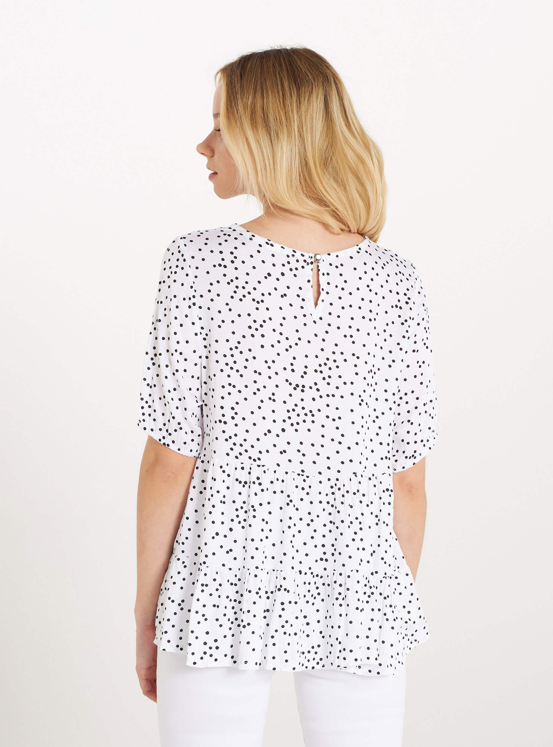 grey blouse with white polka dots