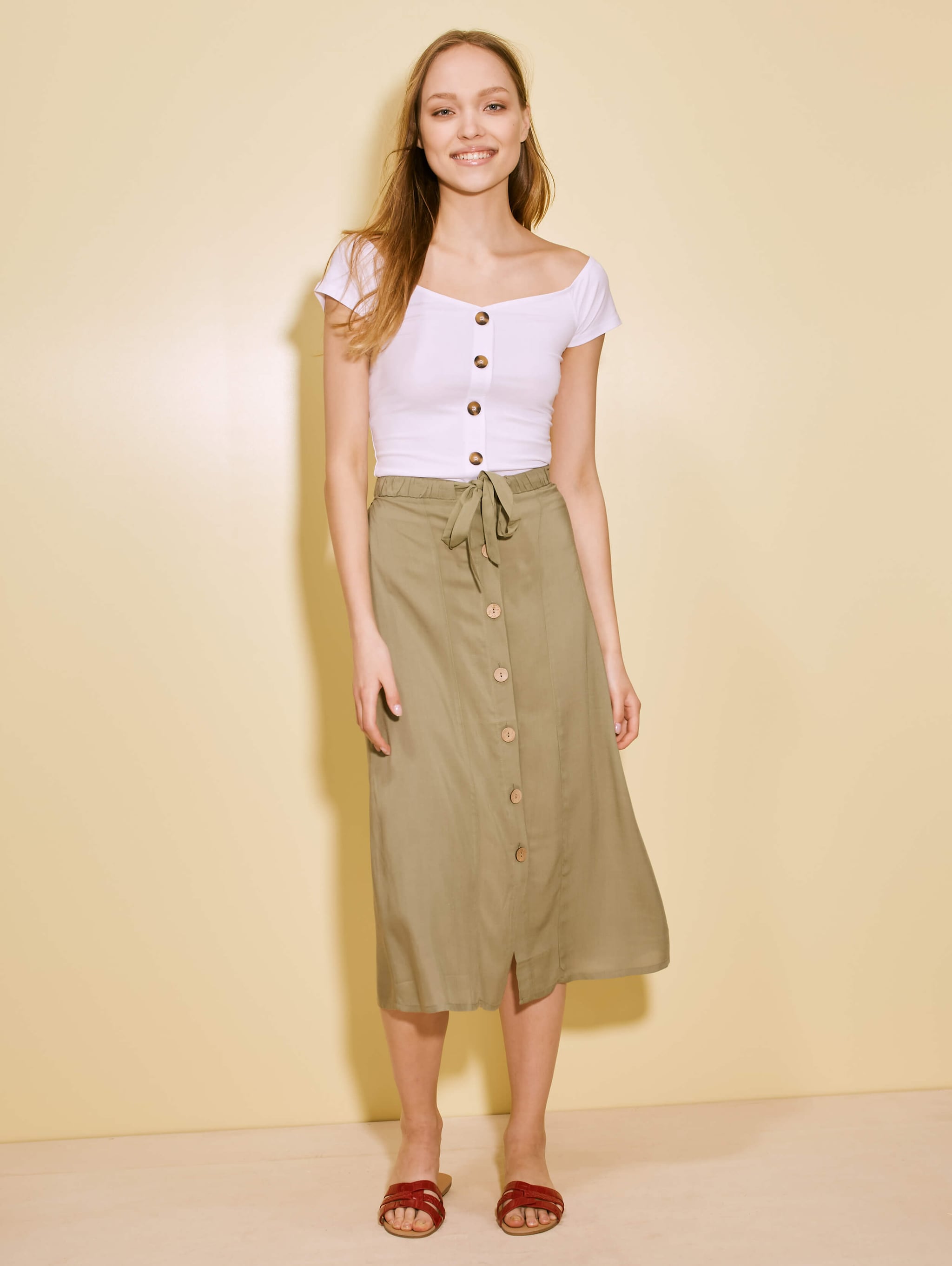 green button skirt