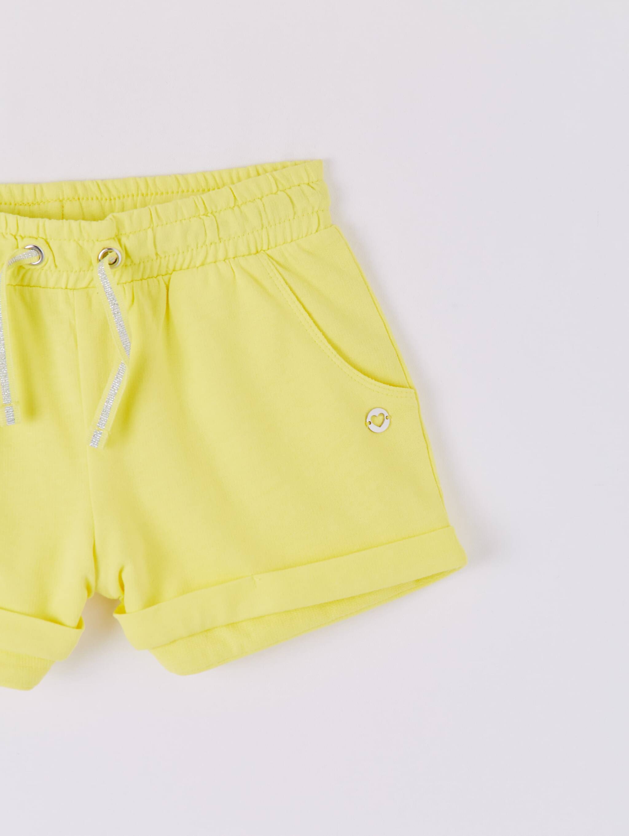 yellow track shorts